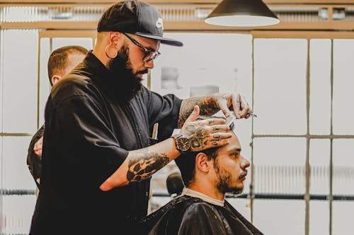 What are the benefits of barber shop memberships or loyalty programs?