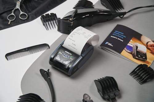 What are the most effective ways to market a barber shop?
