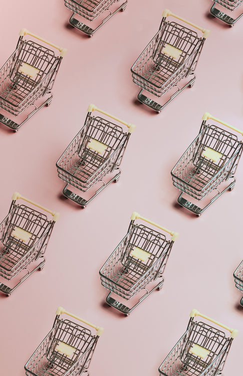 pattern-of-silver-shopping-carts-on-a-pink-background - BarberSets